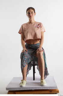  Cynthia  1 casual dressed floral skirt pink crop t shirt sitting whole body yellow sneakers 0007.jpg